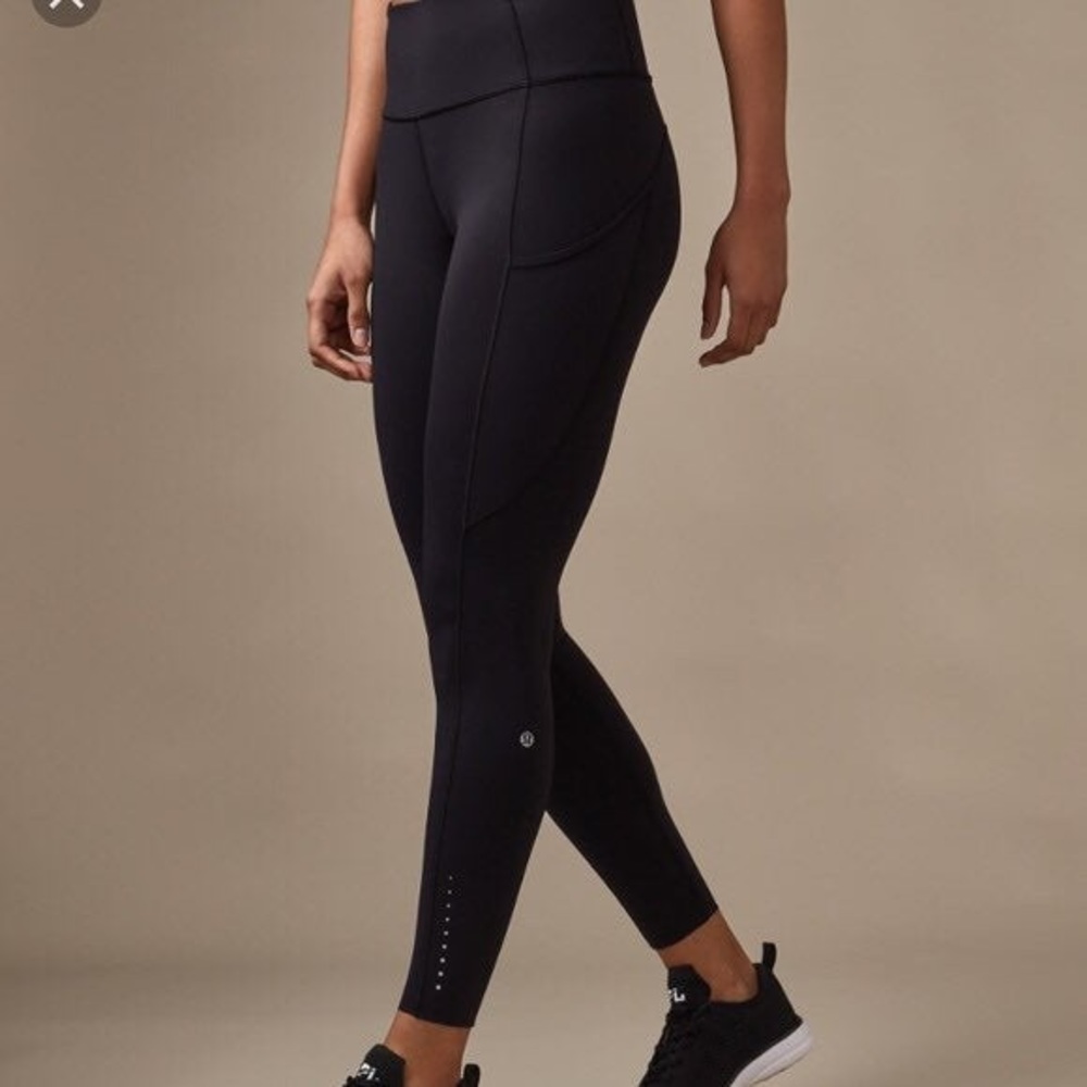Fast and free lululemon black tights size 4